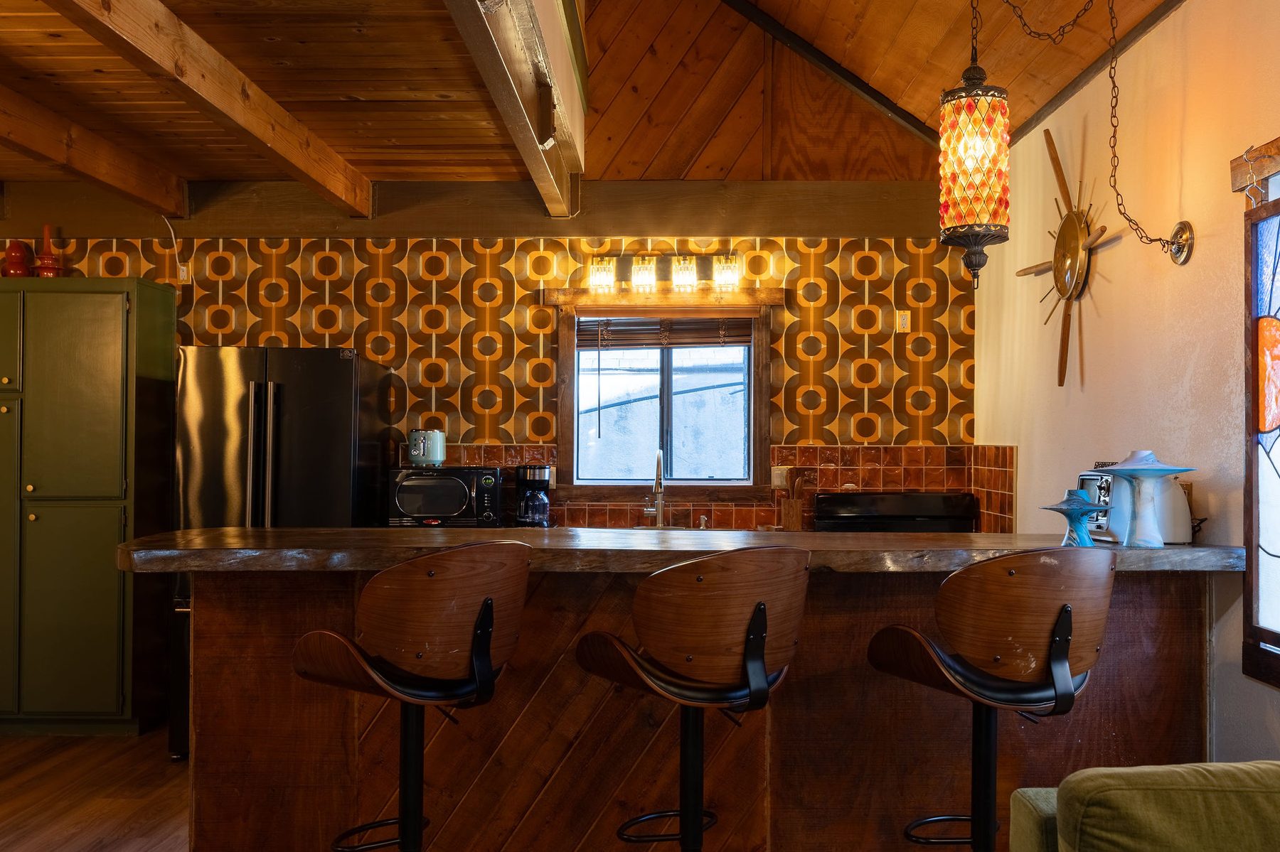 The Burgundy bar with orange patterned wall